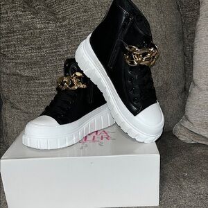 Olivia Miller Black and White Sneakers with Gold Chain